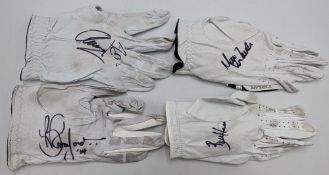4x Signed used Golf Gloves with signatures of Brett Rumford, Mark Warren, Bill Haas, K Aphibarnrat