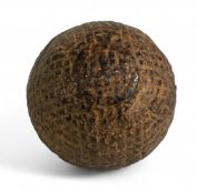 Well used fine mesh Gutty Golf Ball c1895