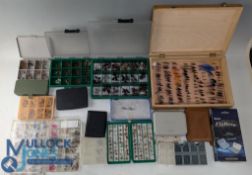 Large quantity of mainly trout flies in variety of plastic compartment boxes, small number of salmon