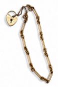 9ct Gold Charm Bracelet with Heart Padlock 9.7