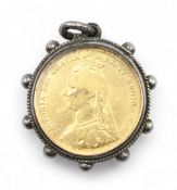 1887 Gilt Sixpence coin with enamelled front within white metal fob casing