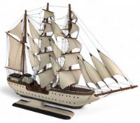 Large Impressive Sailing Ship with White Sails and wooden hull, some loose rigging noted, a bit