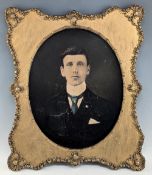 Hand coloured Portrait Photograph, a portrait of a gentleman with high collar and tie, in a good
