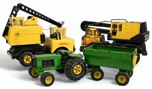Tonka Toys 3 Metal 1970/80s toys 2 Crane examples one in good condition the other overall rusting