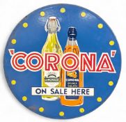 An original 'Corona', A Circular Double Sided Enamel Sign- has been taken out of its swing shop
