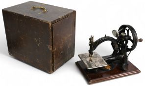 Antique Willcox & Gibbs sewing machine, made in USA, in wooden case no key
