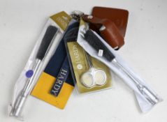 Collection of Hardy game fishing accessories comprising 2x priests, 1x fly line retainer, one pair