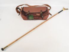 A Bisley canvas/leather trimmed game bag with mesh game carriers, adjustable shoulder straps,