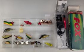 12 assorted metal/plastic lures, including 3 x Abu Garcia Atom, rubber baits & plugs, plus a Fox