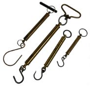 Collection of brass spring scales, as follows: Salter 20kg with hand grip. Salter 10lb with 'T'