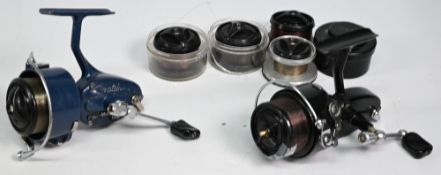 A pair of Mitchell fixed spool reels with 5 spare spools: 330 Automatic LHW, good bail, on/off
