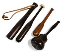 Collection of hardwood priests, one with a leather wrist strap. All with very light use. (4)