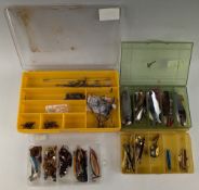 Collection of metal and rubber lures, including The Professor spoon, Abu Atom, Johnson's silver