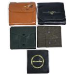 Collection of cast and leader wallets, as follows: Richard Wheatley leather ring binder with 5 pages