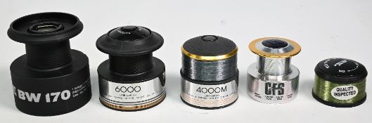 A collection of fixed spool spare spools, as follows: Shimano 6000, Shimano 4000M, CFS, spool
