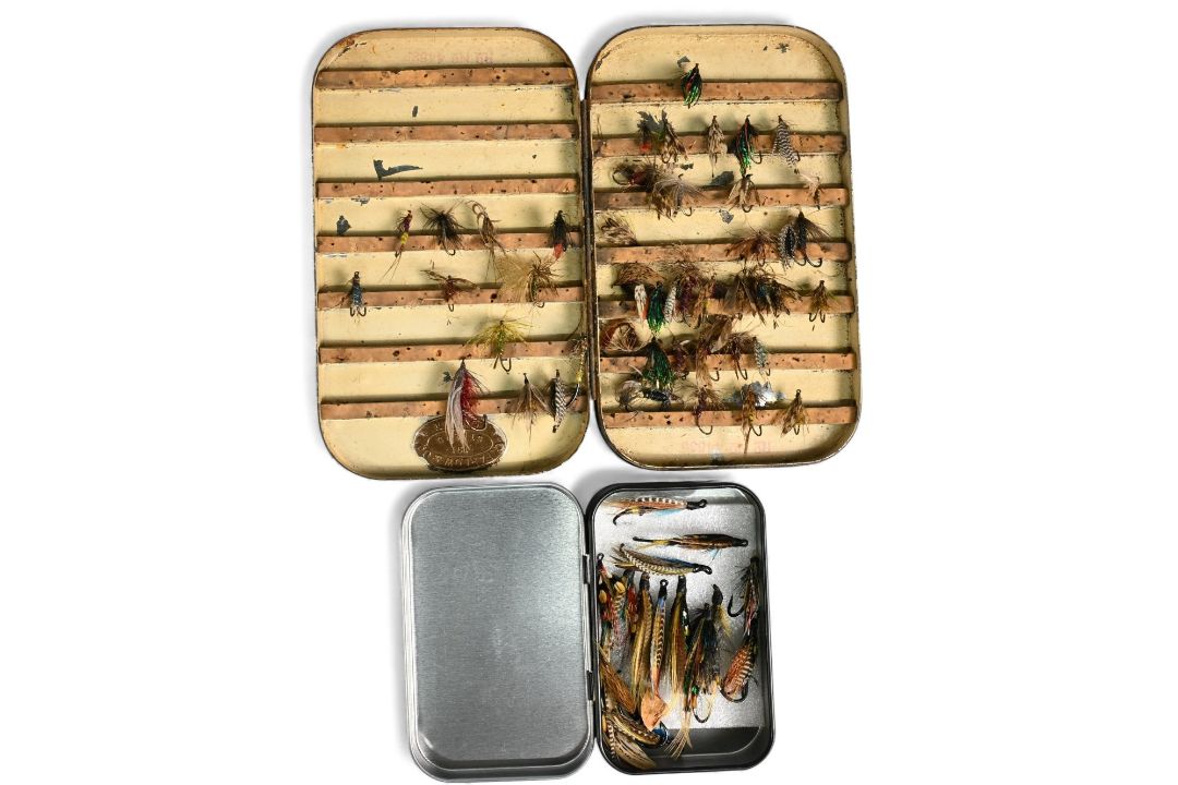 C Farlow's black japanned fly box with flies containing various trout flies and a modern pocket - Image 1 of 2