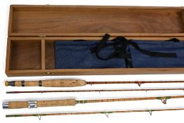 A fine and interesting pair of split cane rods in a presentation walnut case. Rods made by Clive