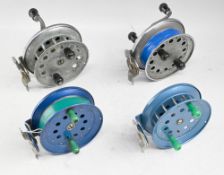 4x twisting foot side cast reels, 2 x Olympic Seiko of Japan, brake/ratchet controls, geared and 2 x