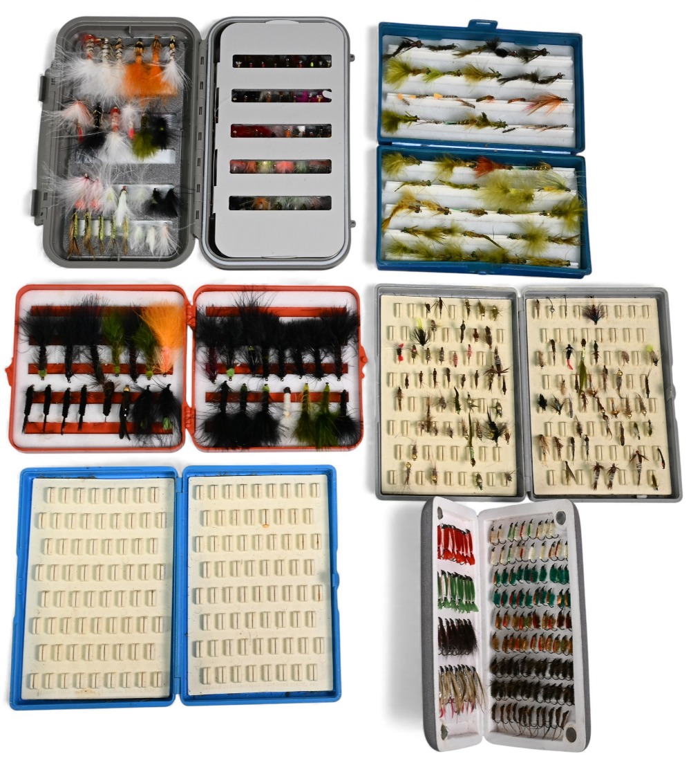 Collection of plastic fly boxes, as follows: C&F 8" x 5" swing leaf and quantity of trout lures.