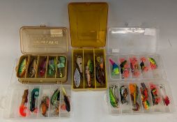 Collection of plastic and rubber fishing lures, including jointed models, makers include Poes,
