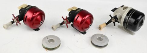 2x Abumatic 60 vintage bait casting reels, one with small dig to housing and an Abumatic 80 reel,