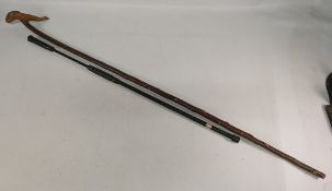 Fish Carved Top Walking Stick/Wading Staff with a Ledda extendable net handle, possibly a salmon