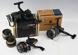 Abu Cardinal 755 rear drag spinning reel, with 2 spare spools in box, an Abu 855 reel with free