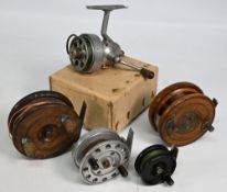 A collection of assorted reels, as follows: Mahogany and brass star back reel, 4