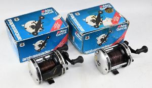 Pair of Abu Ambassadeur 6500 multiplier reels, in silver finish, good working condition, c/w
