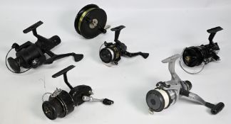 A graveyard of reels to include: Steelite centre pin, Shakespeare Mustang, Daiwa RS1600, Daiwa
