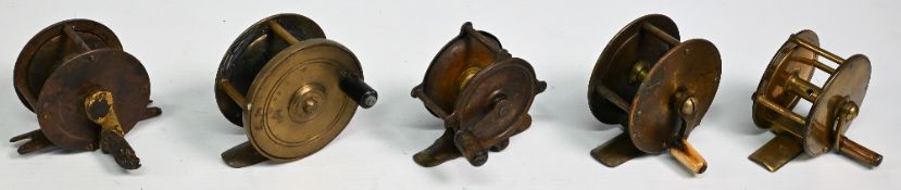 A group of brass reels, all unnamed, in various conditions (5)