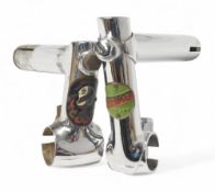 Early Handle Bar Stems two both having external top bolds and makers enamel badges to top Il Primo