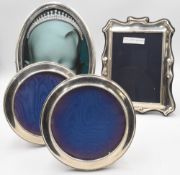 Hallmarked Silver Photo / Picture Frames: pair of matching round 1988 and 1989 14cm diameter, an