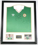 Framed Republic of Ireland international match replica shirt signed by Paul McGrath + photos; superb