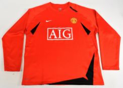 Manchester United FC memorabilia to include a 2007-2009 Home football shirt Size XL, a scarf,