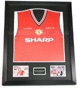 1985 Framed and signed 1985 Manchester United FA Cup Final replica shirt and photos, ready to