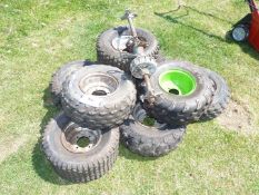 Eight ATV wheels and tyres and rear axle drive, (possibly 9 x 8 low pressure).