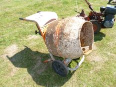 A Belle cement mixer ( engine turns).