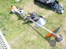 A Stihl FS410C Strimmer with harness, running order.