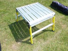 Small metal steps/platform.