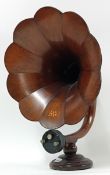 An 'EWB' wooden fluted gramophone horn on a wooden base, with Brown speaker unit type 'U', patent