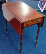A George III Pembroke table, with satinwood details, interior drawer, on turned legs with castors,