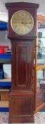 A George III flame mahogany 8 day longcase clock, brass round rial having Roman and Arabic secondary