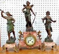 An early 20th century blush marble mantle clock ensemble, to include an Arabic enamel dial in a gilt