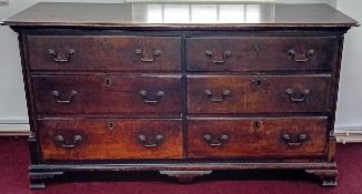 A George III Lancashire type chest of drawers, to include six drawers, on ogee bracket feet, with