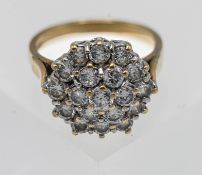 A 9ct gold CZ set cluster ring, size P.