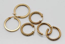 A collection of three gold earrings, one pair marked 9ct, total weight 4.4g