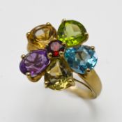 An impressive large multi stone 'Flower' cluster dress ring, set in 9ct yellow gold, with garnet,