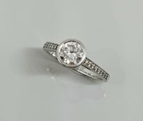 A VVSI diamond solitaire ring, set in platinum with single round brilliant cut diamond, set with