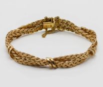 A 9ct Italian UnoAErre twist bracelet, approx 24.8g.